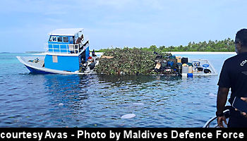 courtesy Avas - Boat enroute to Male runs aground on Noonu Lofaru reef